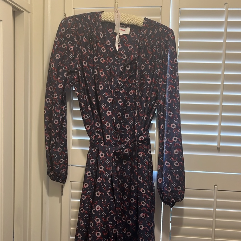 Xirena navy blue dress with raspberry and blush pink geometric pattern.